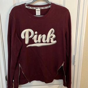 Maroon lightweight sweatshirt by PINK. Size medium. Zip detail at waist.